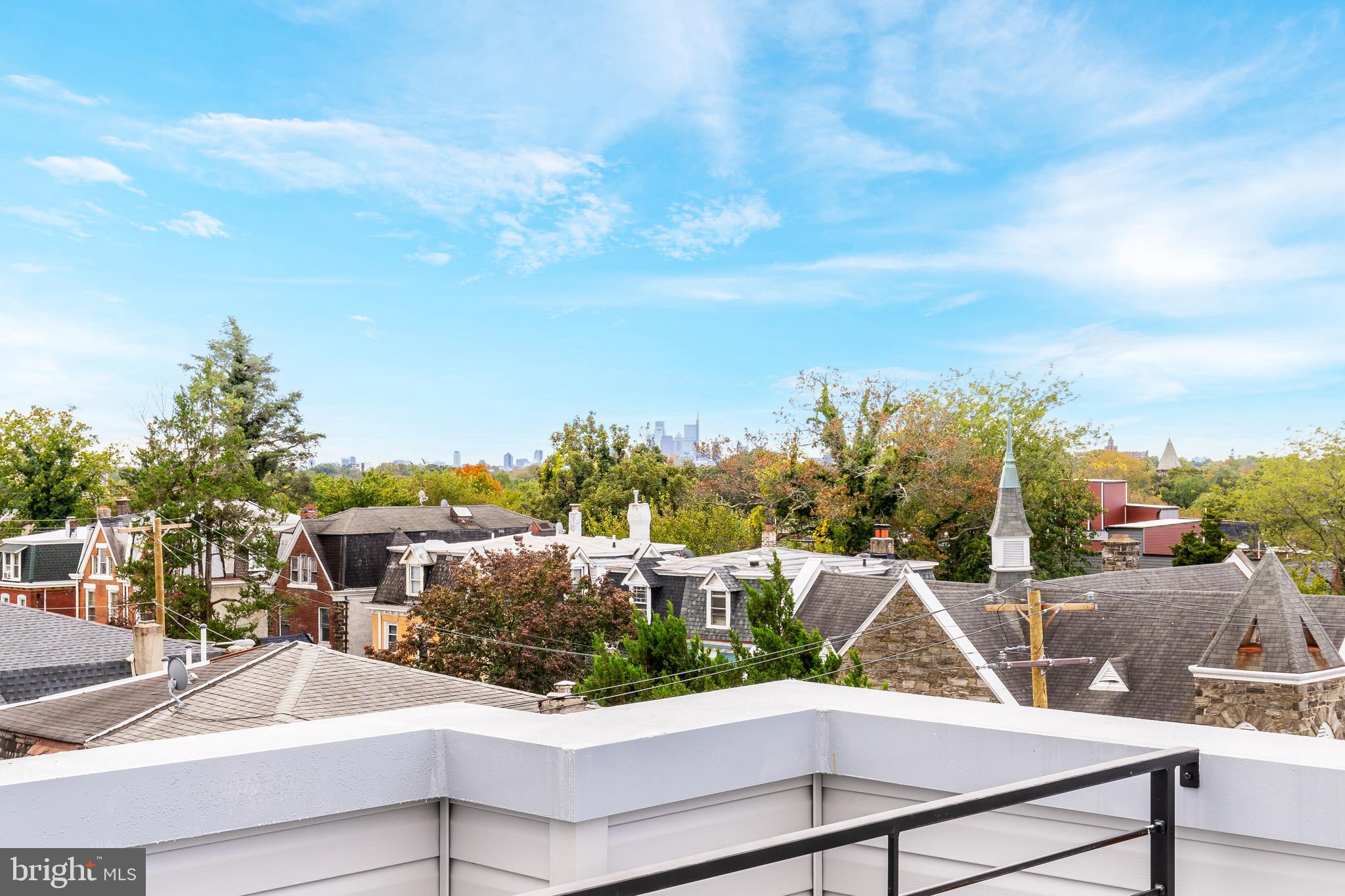 103 East Duval Street, Unit 1 Philadelphia, PA 19144 - Photo 31 of 32 a view of a swimming pool with an outdoor seating