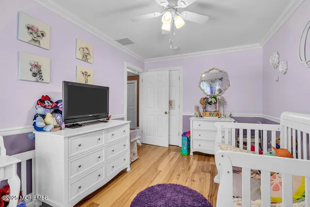a room with furniture and flat screen tv