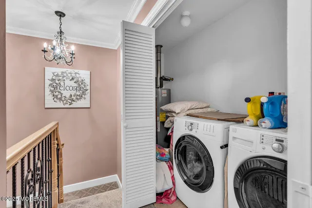 a view of livingroom with washer and dryer