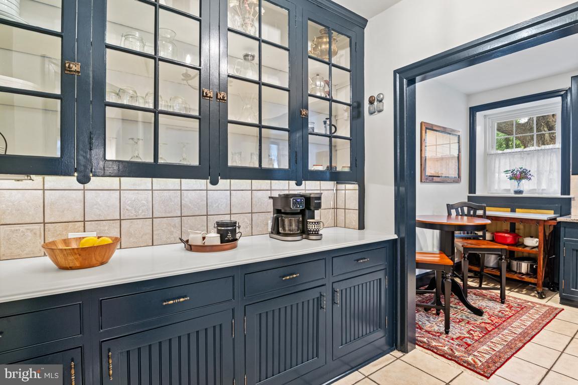 8023 Seminole Street Philadelphia, PA 19118 - Photo 13 of 42 a kitchen with a sink and a window
