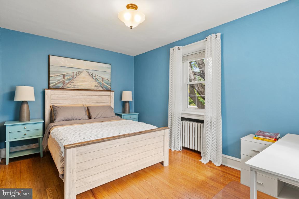 8023 Seminole Street Philadelphia, PA 19118 - Photo 25 of 42 a bedroom with a bed and a window