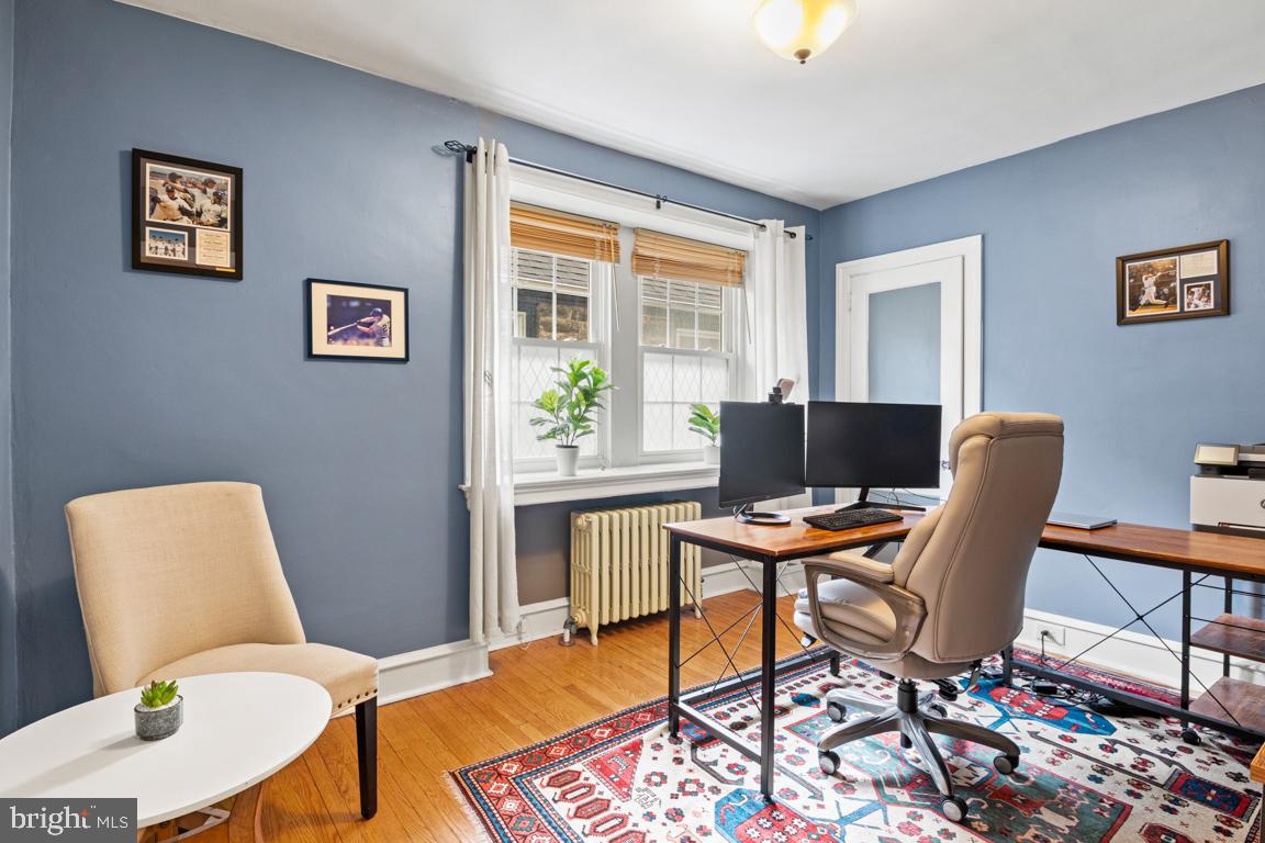 8023 Seminole Street Philadelphia, PA 19118 - Photo 28 of 42 a work room with furniture and a window