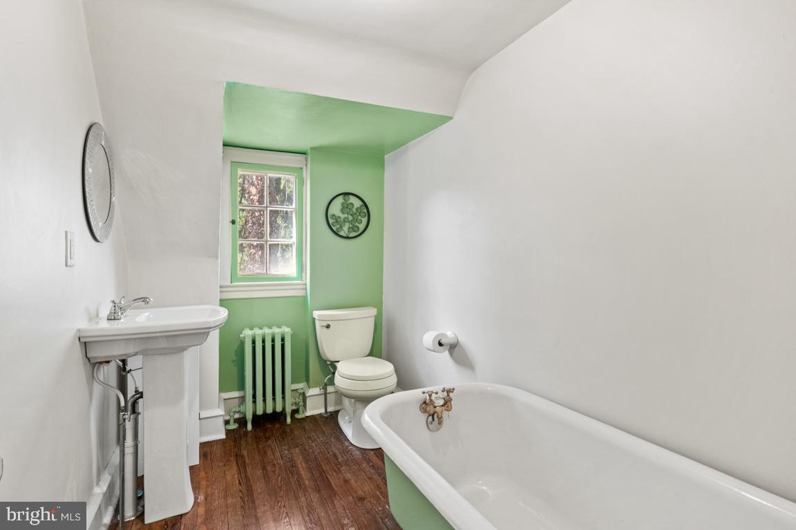 8023 Seminole Street Philadelphia, PA 19118 - Photo 33 of 42 a bathroom with a sink and a mirror