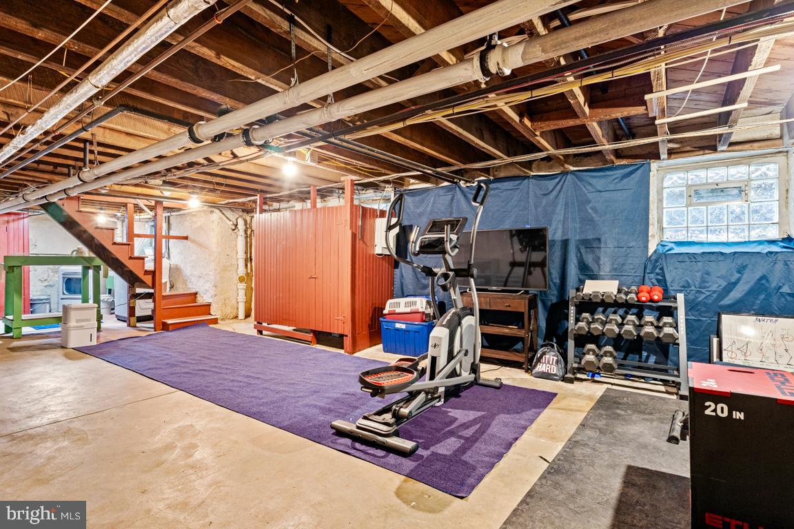 8023 Seminole Street Philadelphia, PA 19118 - Photo 36 of 42 a view of a room with gym equipment