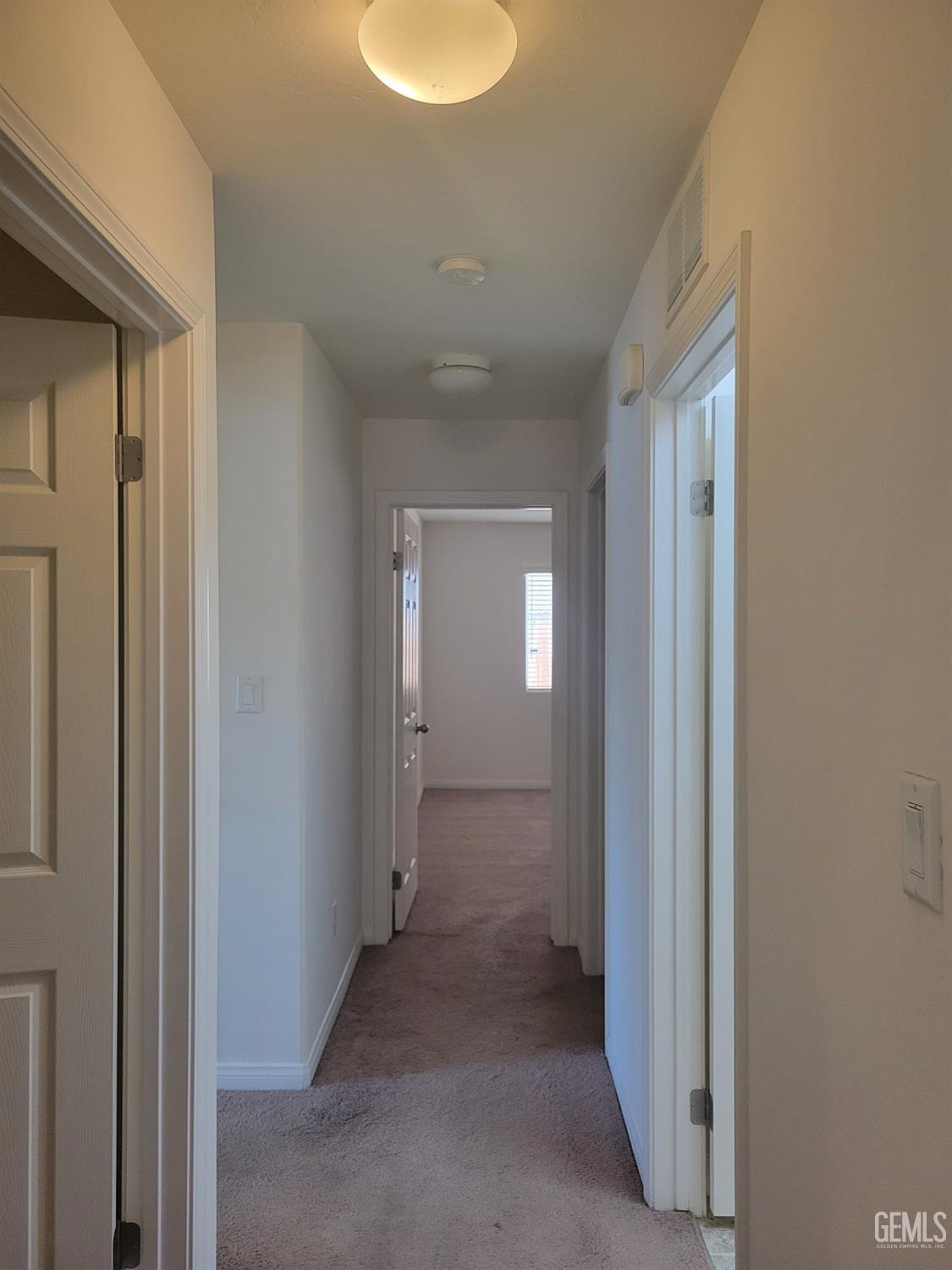 Undisclosed Address Bakersfield, CA 93311 - Photo 11 of 23 a view of a hallway with a room