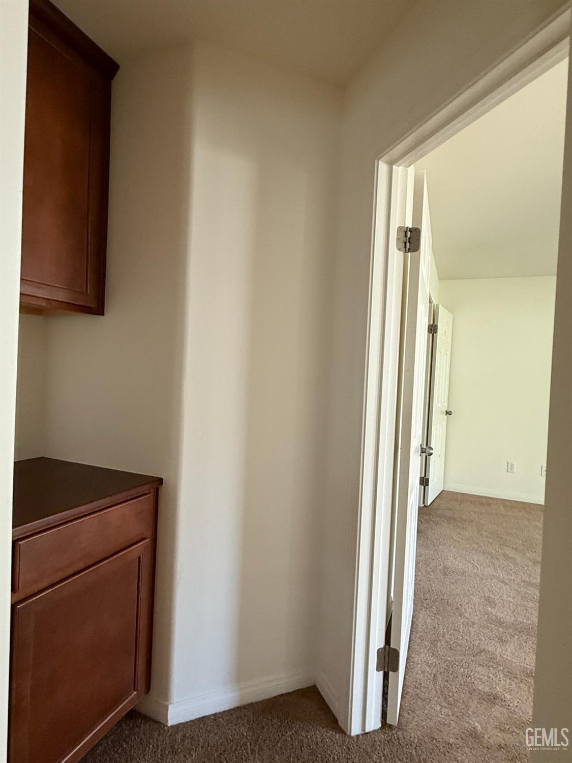 Undisclosed Address Bakersfield, CA 93311 - Photo 13 of 23 a view of a hallway with storage space