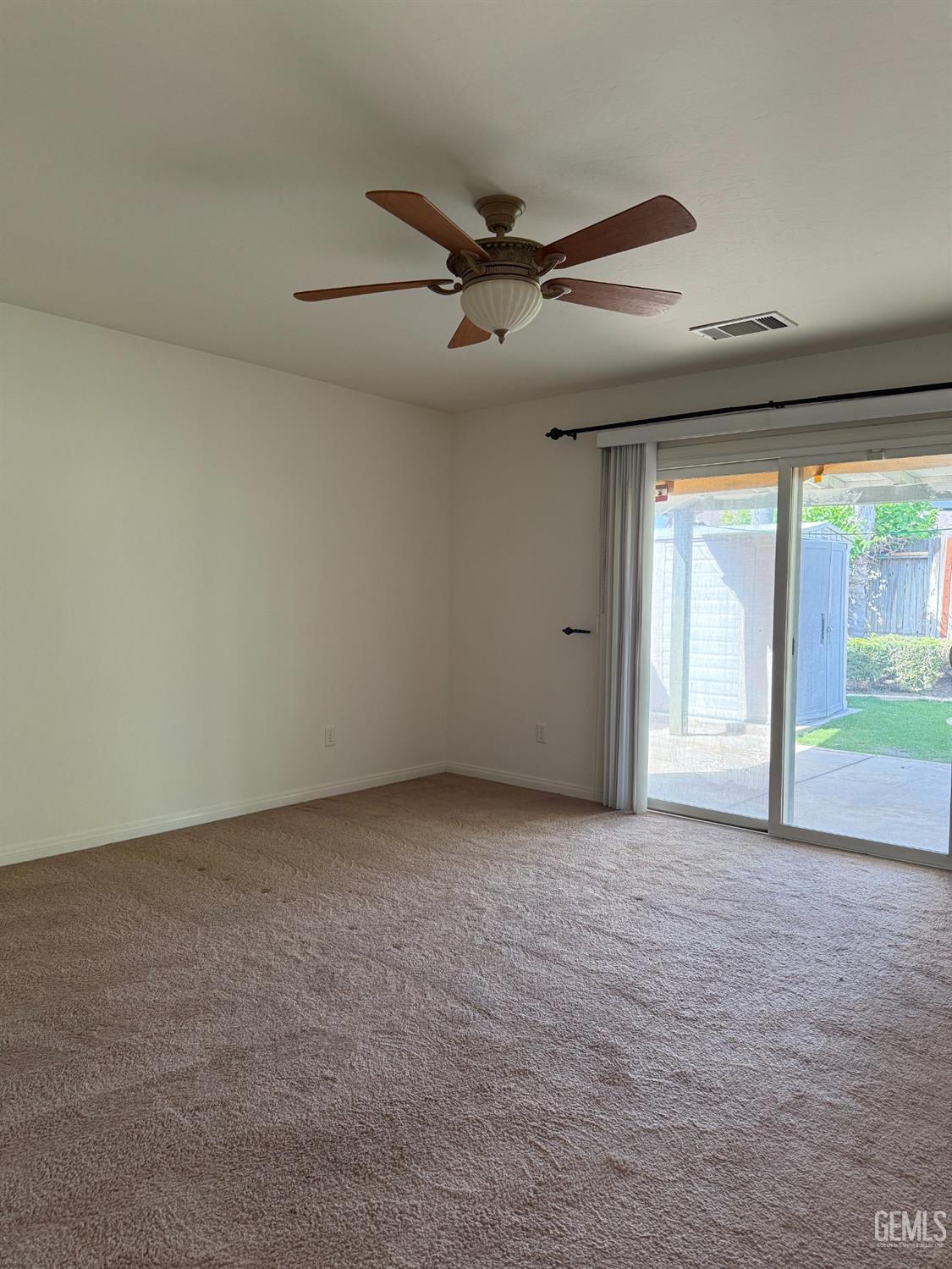 Undisclosed Address Bakersfield, CA 93311 - Photo 14 of 23 a view of an empty room with a window