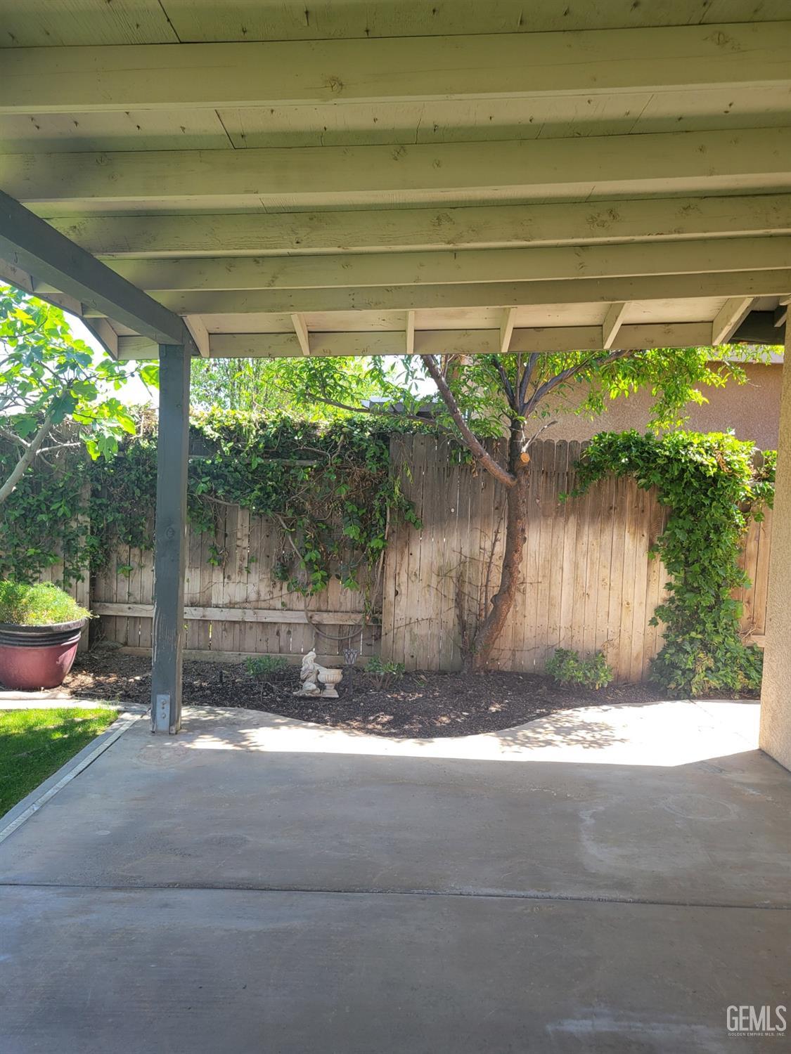Undisclosed Address Bakersfield, CA 93311 - Photo 19 of 23 a view of backyard with green space