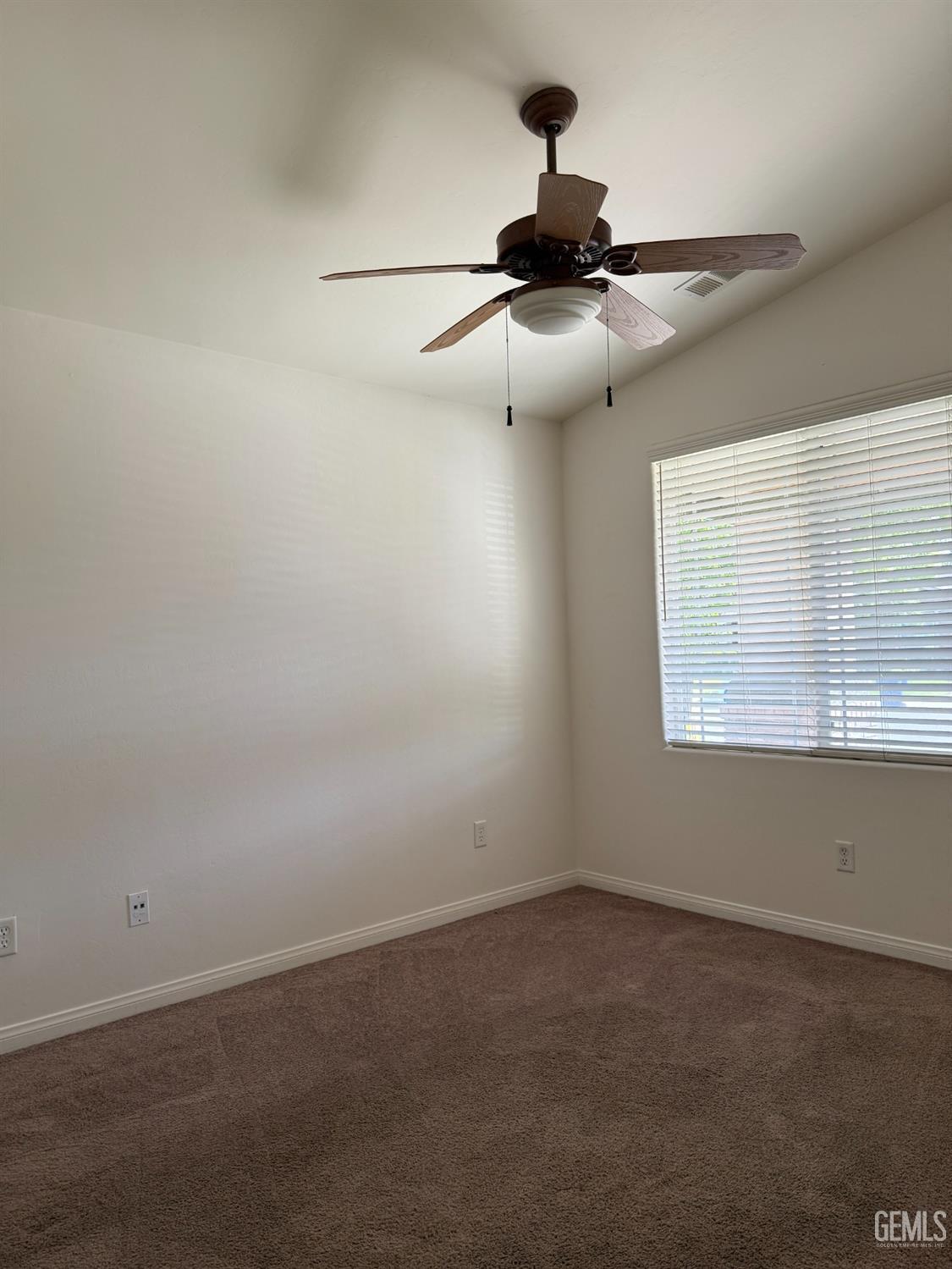 Undisclosed Address Bakersfield, CA 93311 - Photo 7 of 23 a view of an empty room with a window