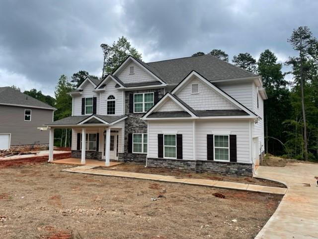 2815 Pilgrim Mill Road Cumming, GA 30041 - Photo 1 of 1 a front view of a house with a yard