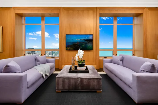 a living room with furniture and a window