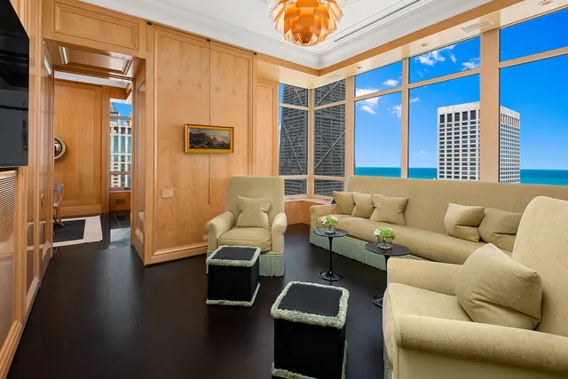 a bedroom with a bed and a night stand