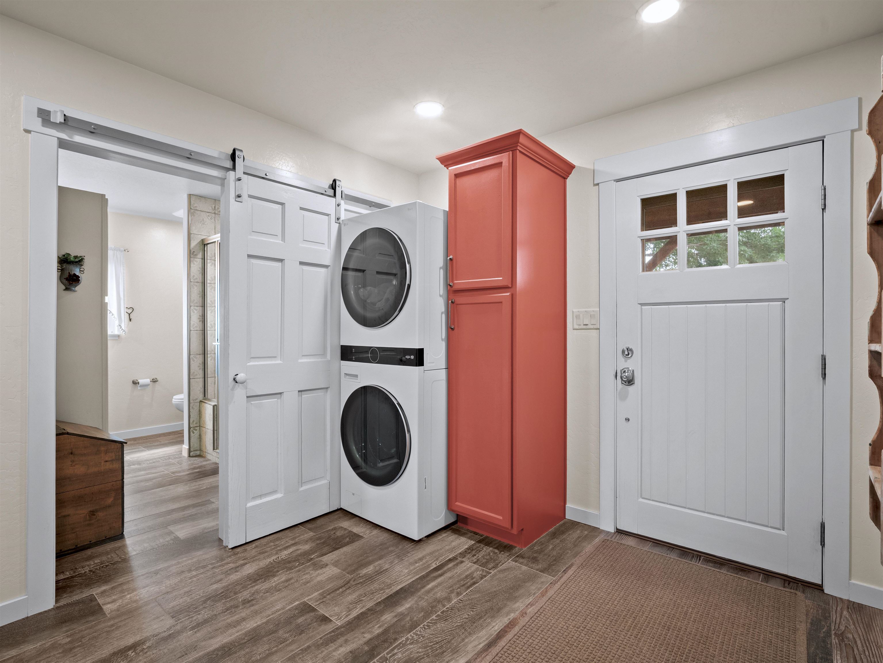 1161 23 Road Grand Junction, CO 81505 - Photo 26 of 35 a view of a hallway with washer and dryer
