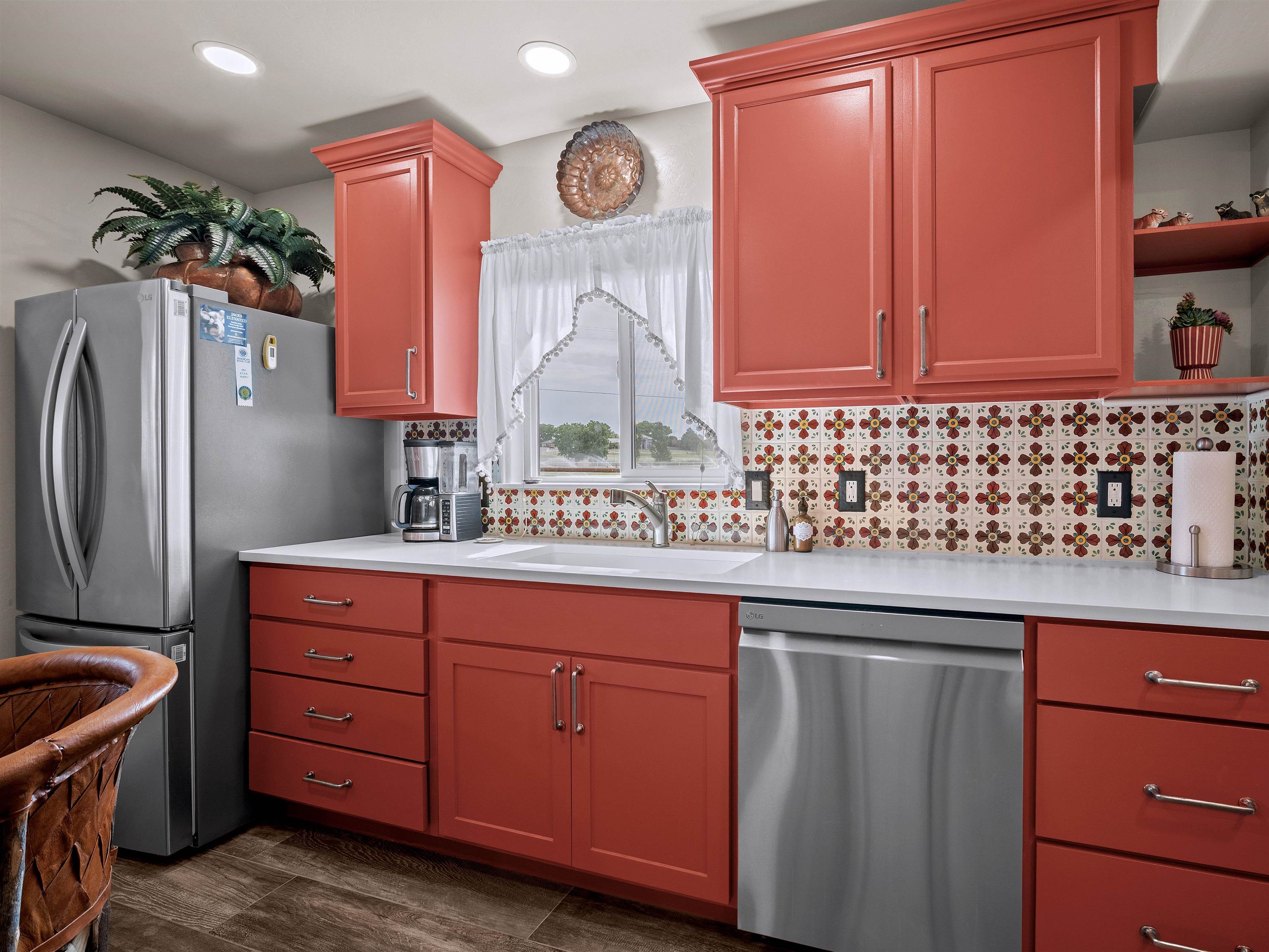 1161 23 Road Grand Junction, CO 81505 - Photo 30 of 35 a kitchen with stainless steel appliances granite countertop a sink a stove and a refrigerator