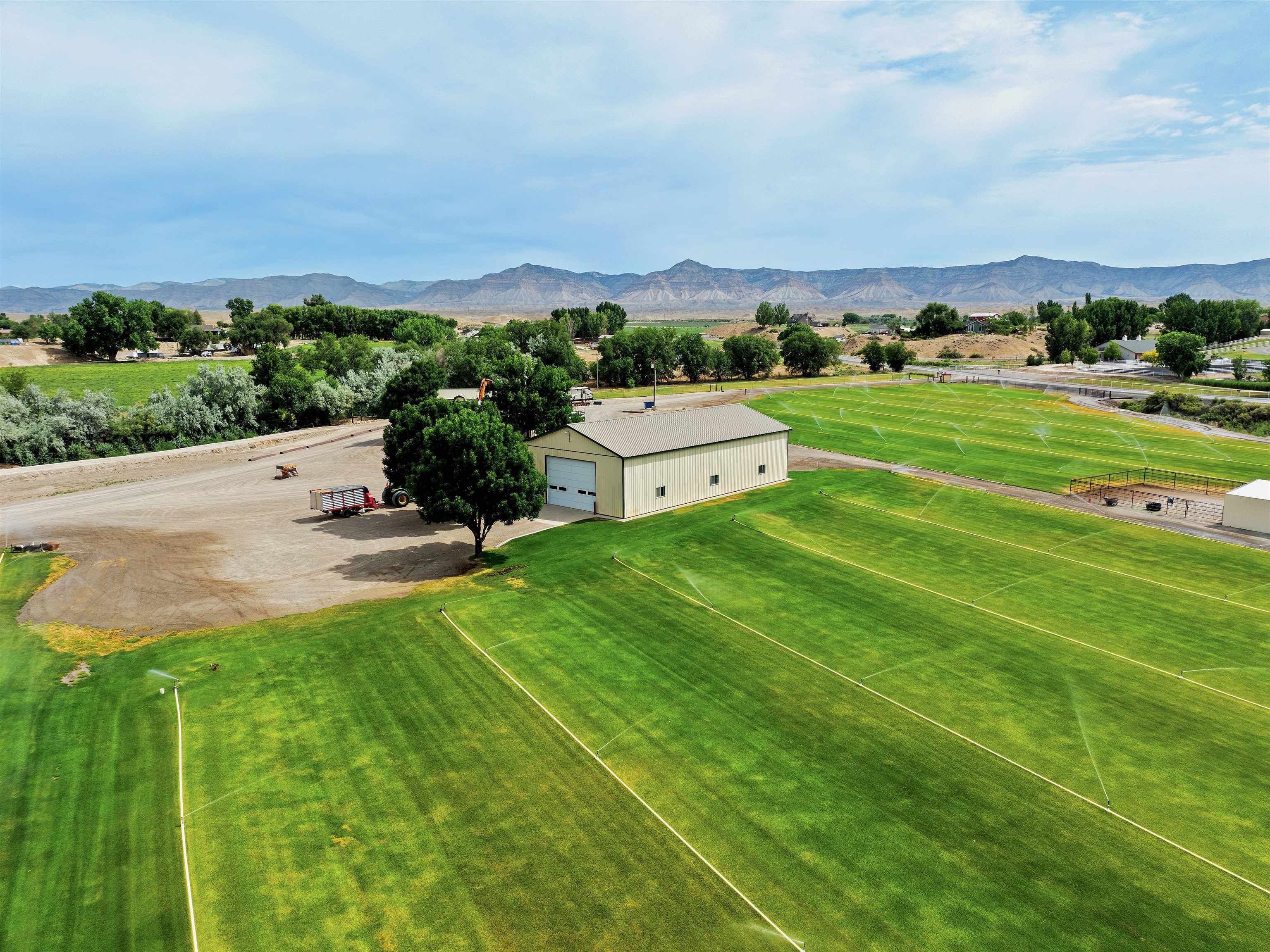 1161 23 Road Grand Junction, CO 81505 - Photo 3 of 35 a view of a terrace with a yard