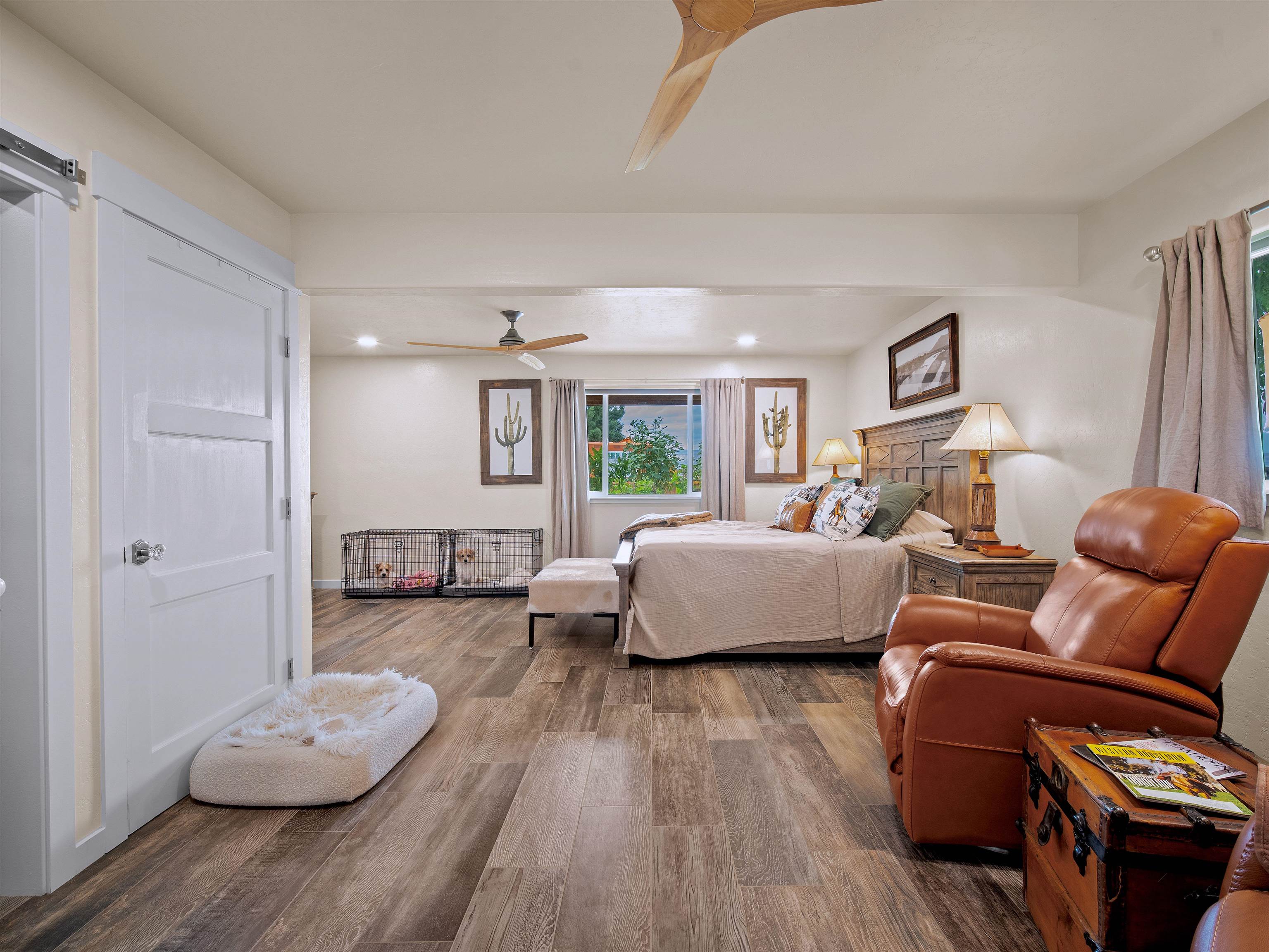 1161 23 Road Grand Junction, CO 81505 - Photo 32 of 35 a bedroom with a bed and wooden floor