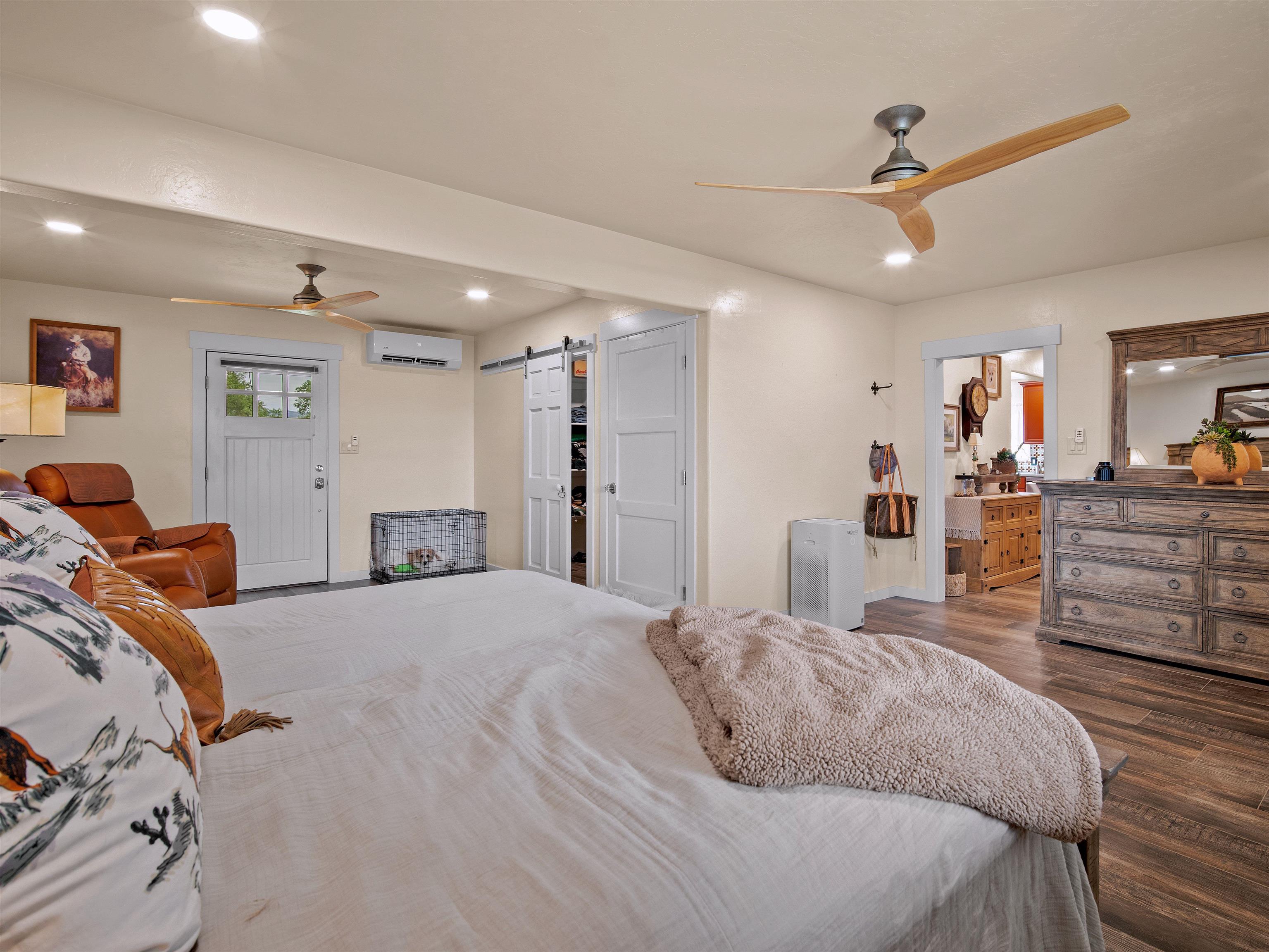 1161 23 Road Grand Junction, CO 81505 - Photo 34 of 35 a large bedroom with a bed and furniture