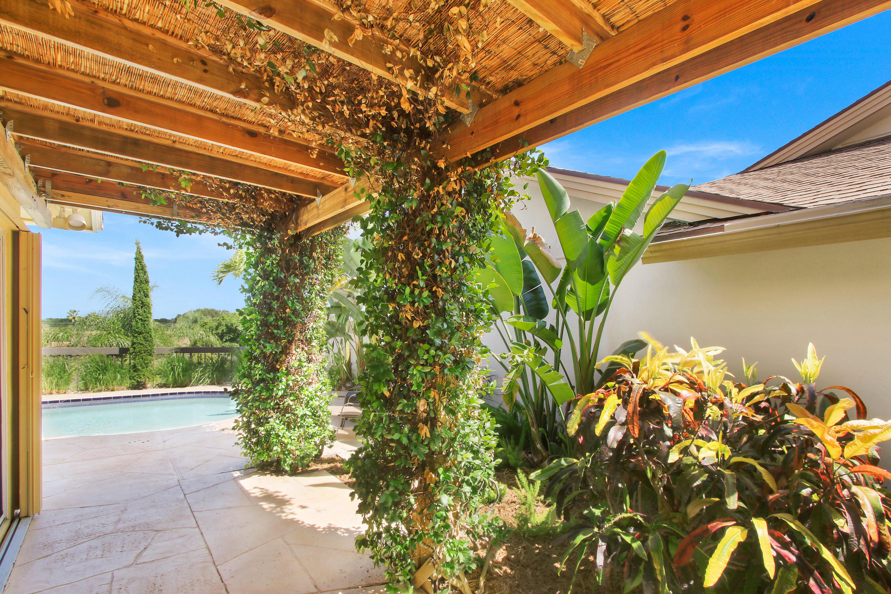 317 Ridge Road Jupiter, FL 33477 - Photo 22 of 33 Pergola offers Shade