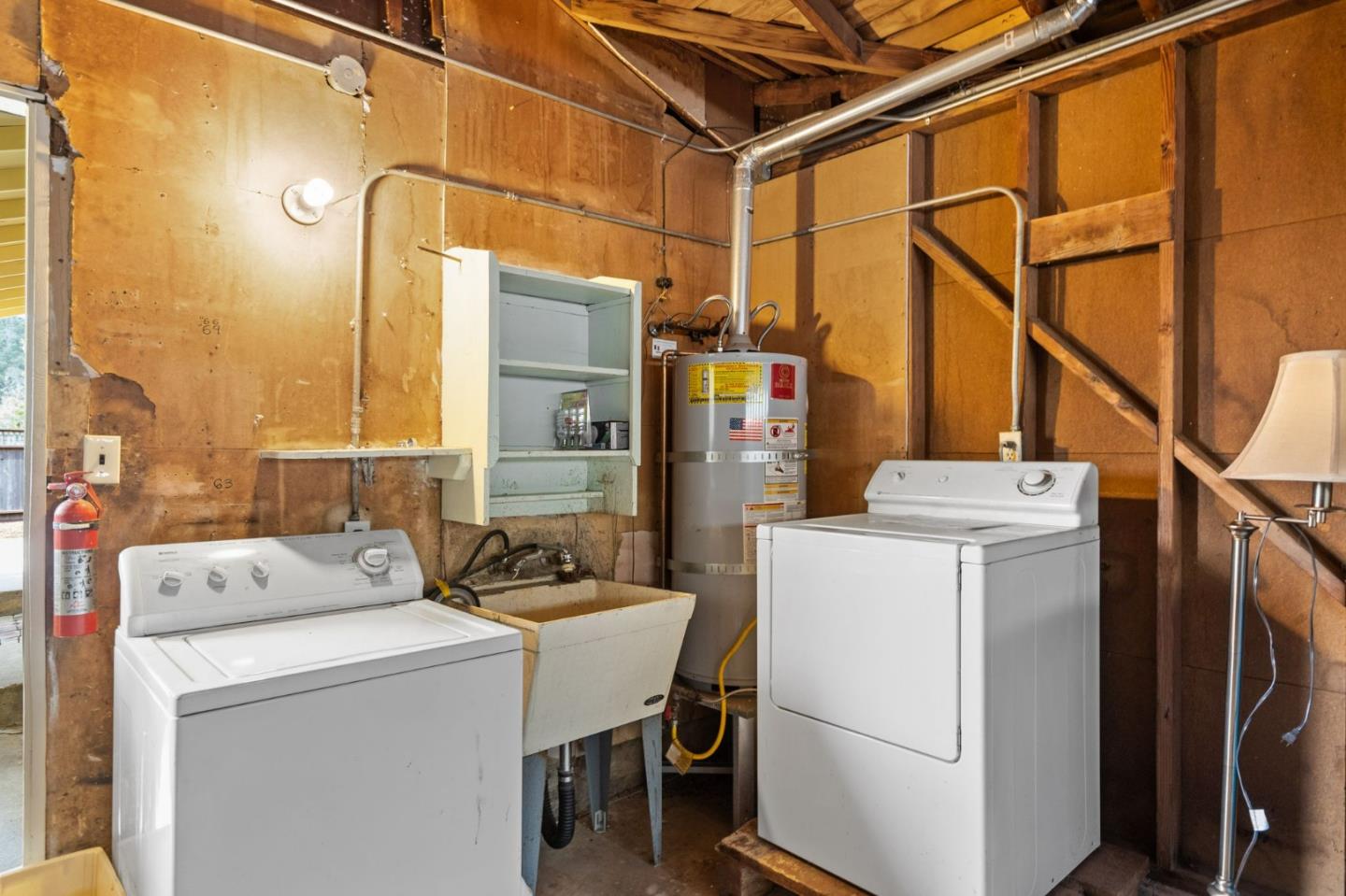 1127 Palou Drive Pacifica, CA 94044 - Photo 19 of 25 a utility room with dryer and washer