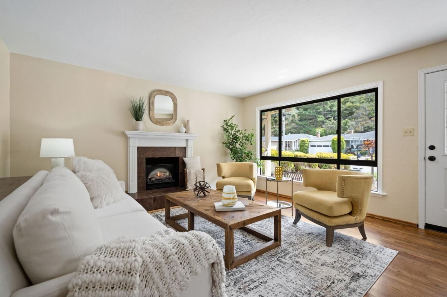 1127 Palou Drive Pacifica, CA 94044 - Photo 4 of 25 a living room with furniture and a fireplace
