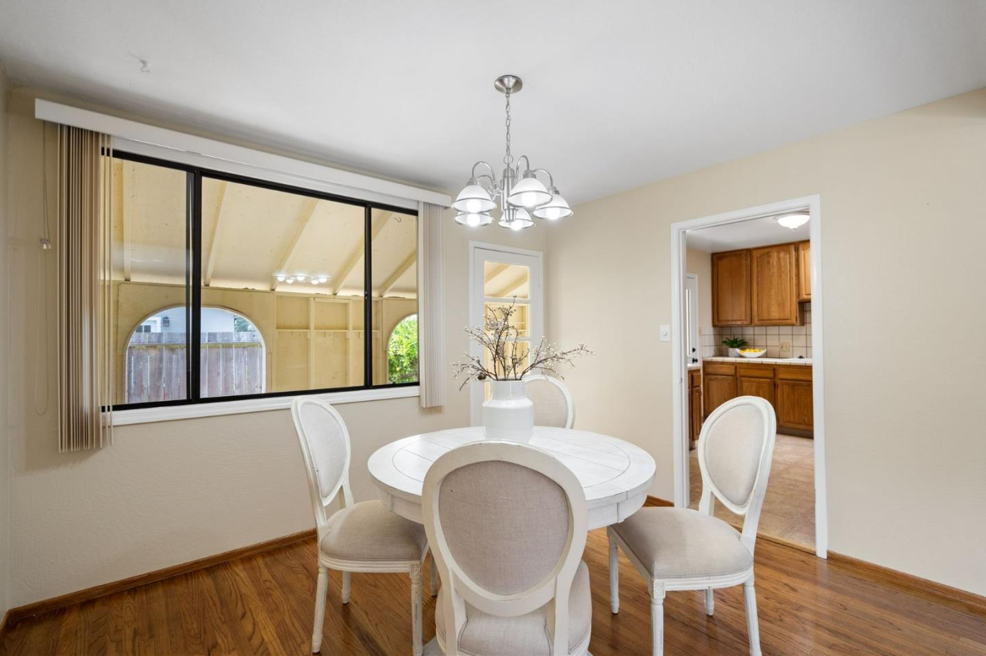1127 Palou Drive Pacifica, CA 94044 - Photo 7 of 25 a dining room with furniture and a large window