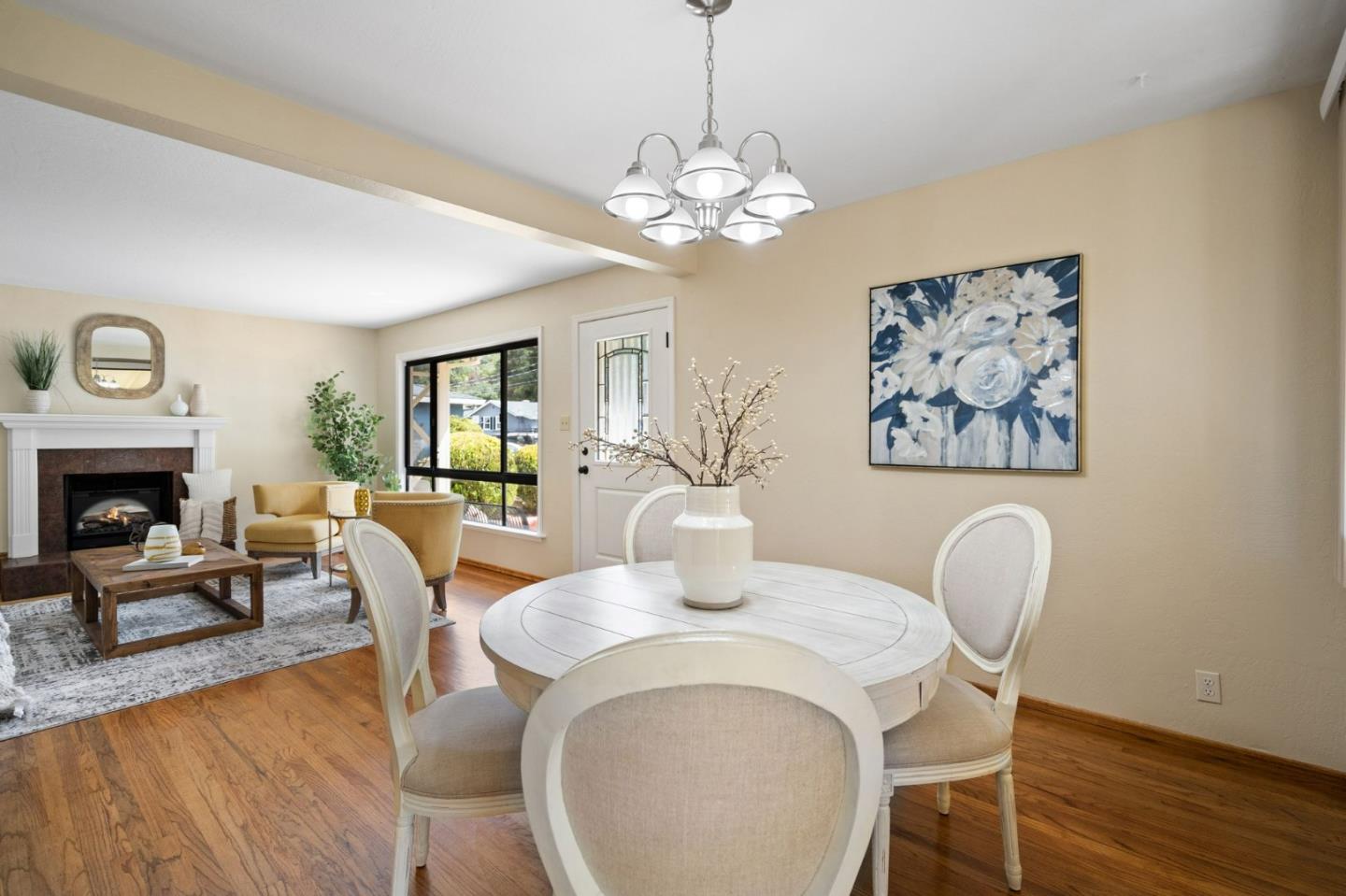 1127 Palou Drive Pacifica, CA 94044 - Photo 8 of 25 a dining room with furniture a fireplace and wooden floor