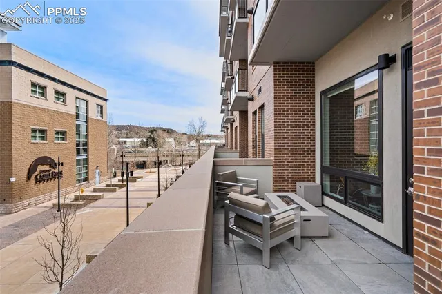 a bedroom with a bed dresser and a window