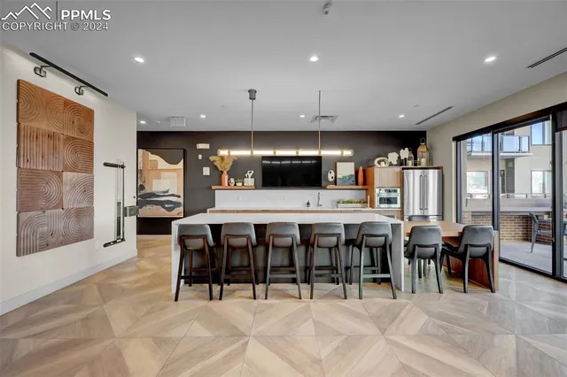 a view of pool with outdoor seating