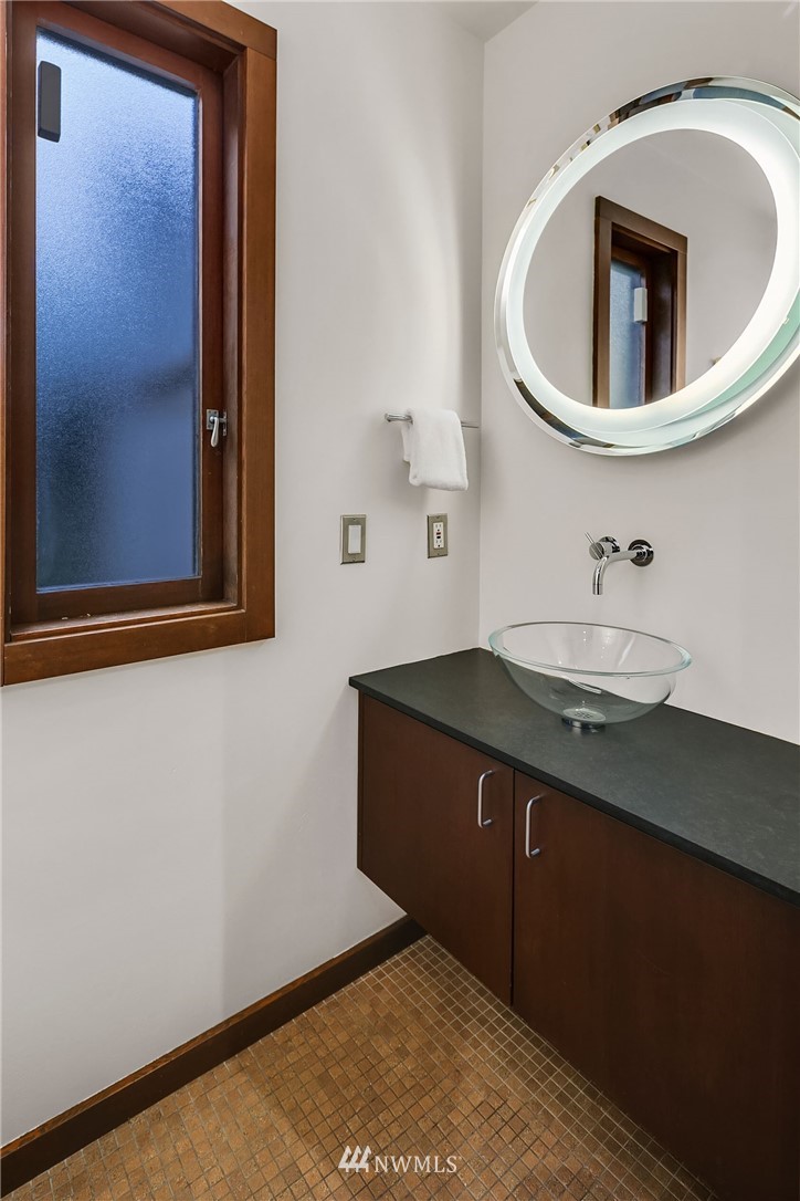 6669 Northeast Windermere Road Seattle, WA 98115 - Photo 21 of 36 a room with a sink and cabinets