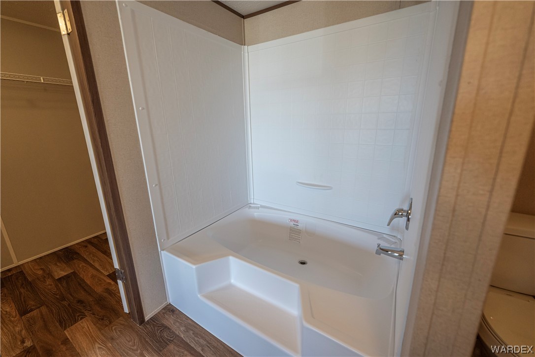 3912 Bouse Road Golden Valley, AZ 86413 - Photo 26 of 38 a bathroom with a bathtub