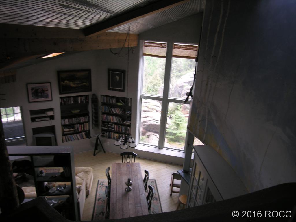 880 Burno Mountain Road Cotopaxi, CO 81223 - Photo 12 of 19 a living room with furniture and a large window