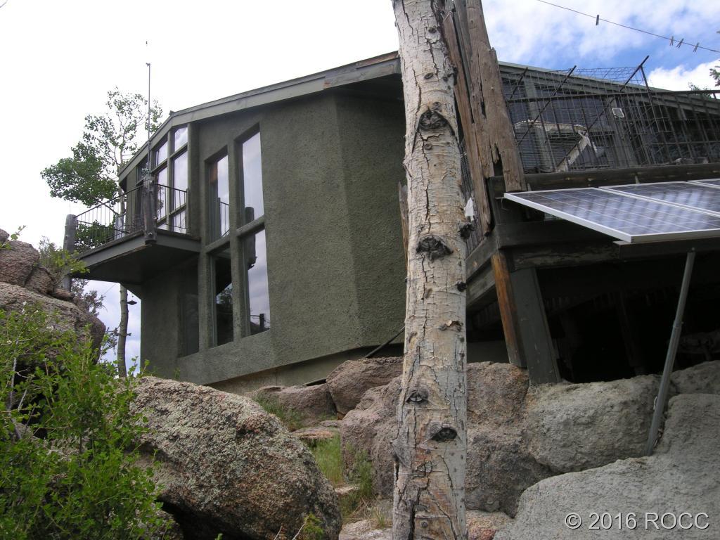 880 Burno Mountain Road Cotopaxi, CO 81223 - Photo 13 of 19 a front view of a house with garden