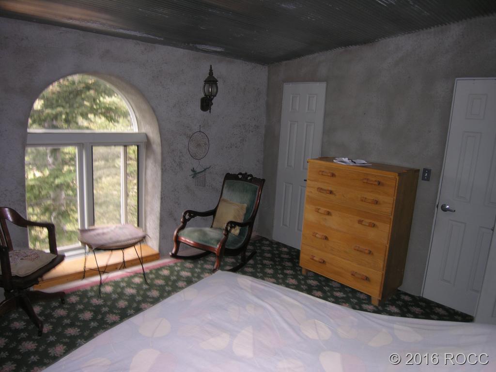 880 Burno Mountain Road Cotopaxi, CO 81223 - Photo 8 of 19 a living room with furniture and a large window