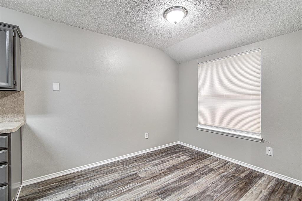636 Green Mountain Road Burleson, TX 76028 - Photo 8 of 19 a view of empty room with wooden floor