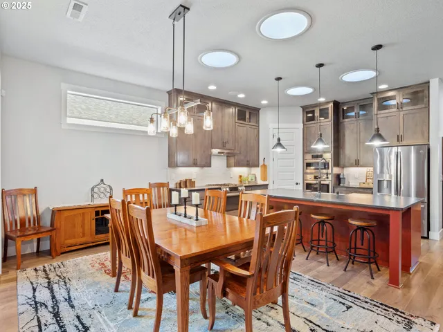 a view of a dining room with furniture