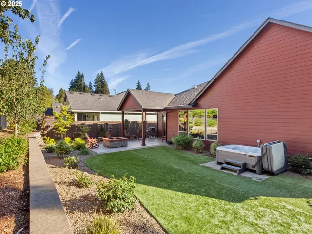 a front view of a house with a garden and porch