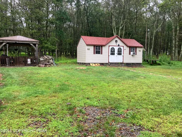 a bedroom with a bed and a closet