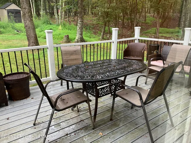 a view of a livingroom with furniture and window