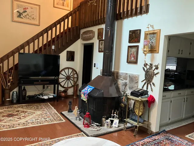a view of a chairs and table in patio