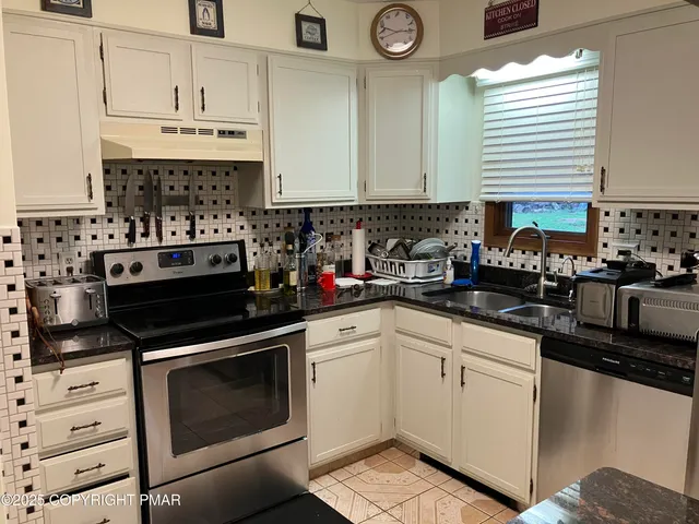 a room with furniture and a window