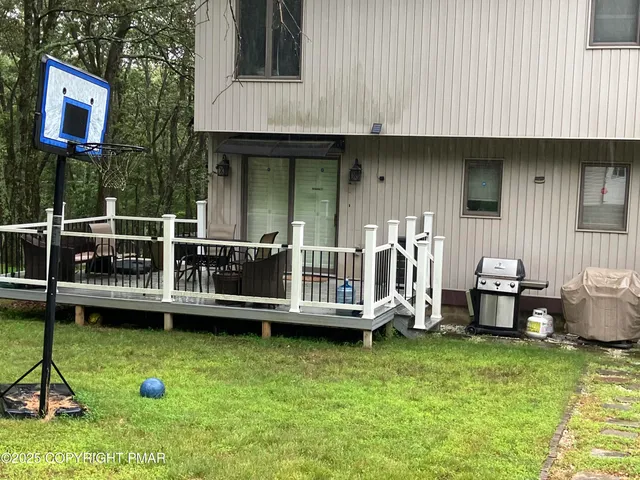 a kitchen with stainless steel appliances granite countertop a refrigerator and stove
