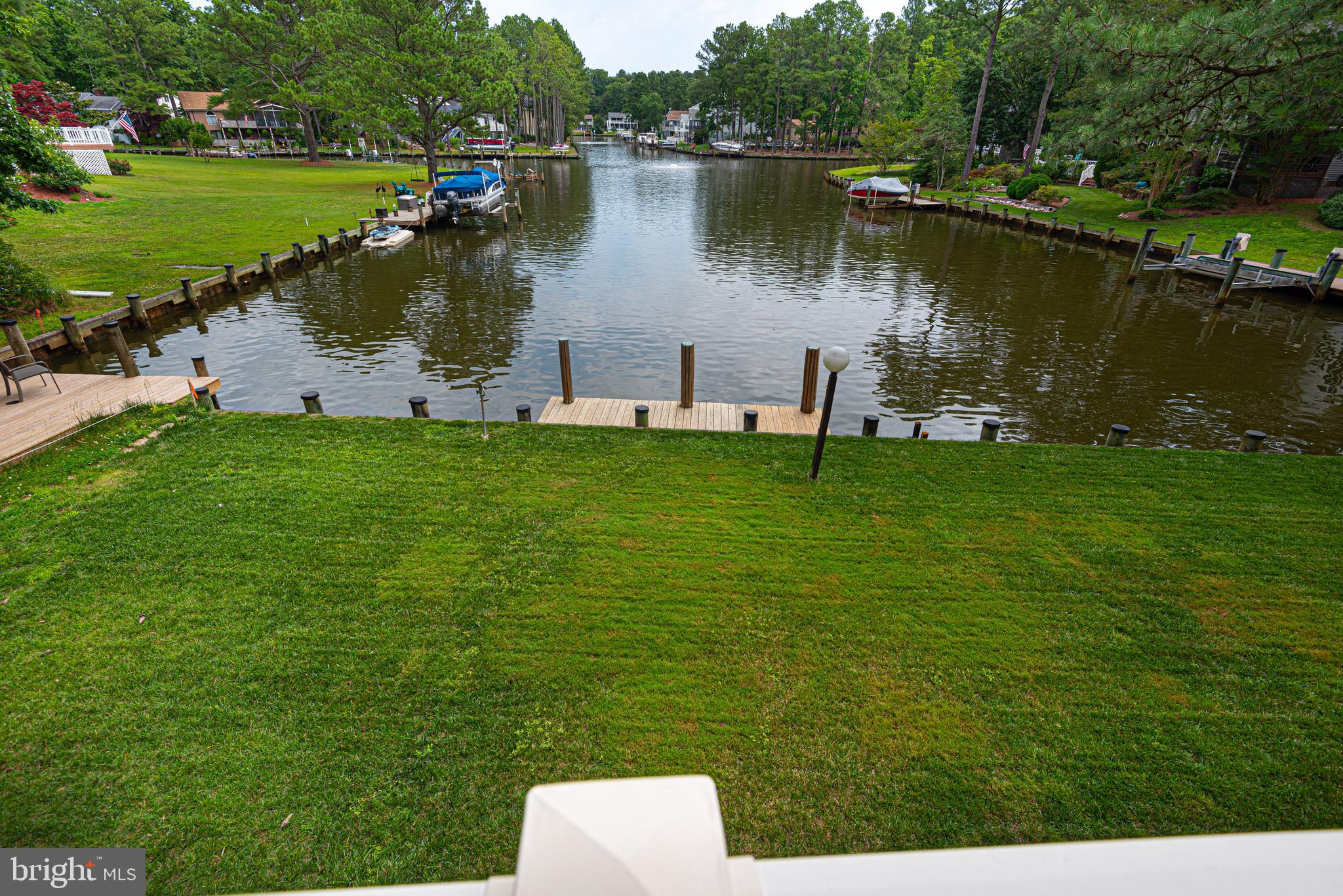 3 Battersea Road Ocean Pines, MD 21811 - Photo 42 of 72 yard and canal view from deck