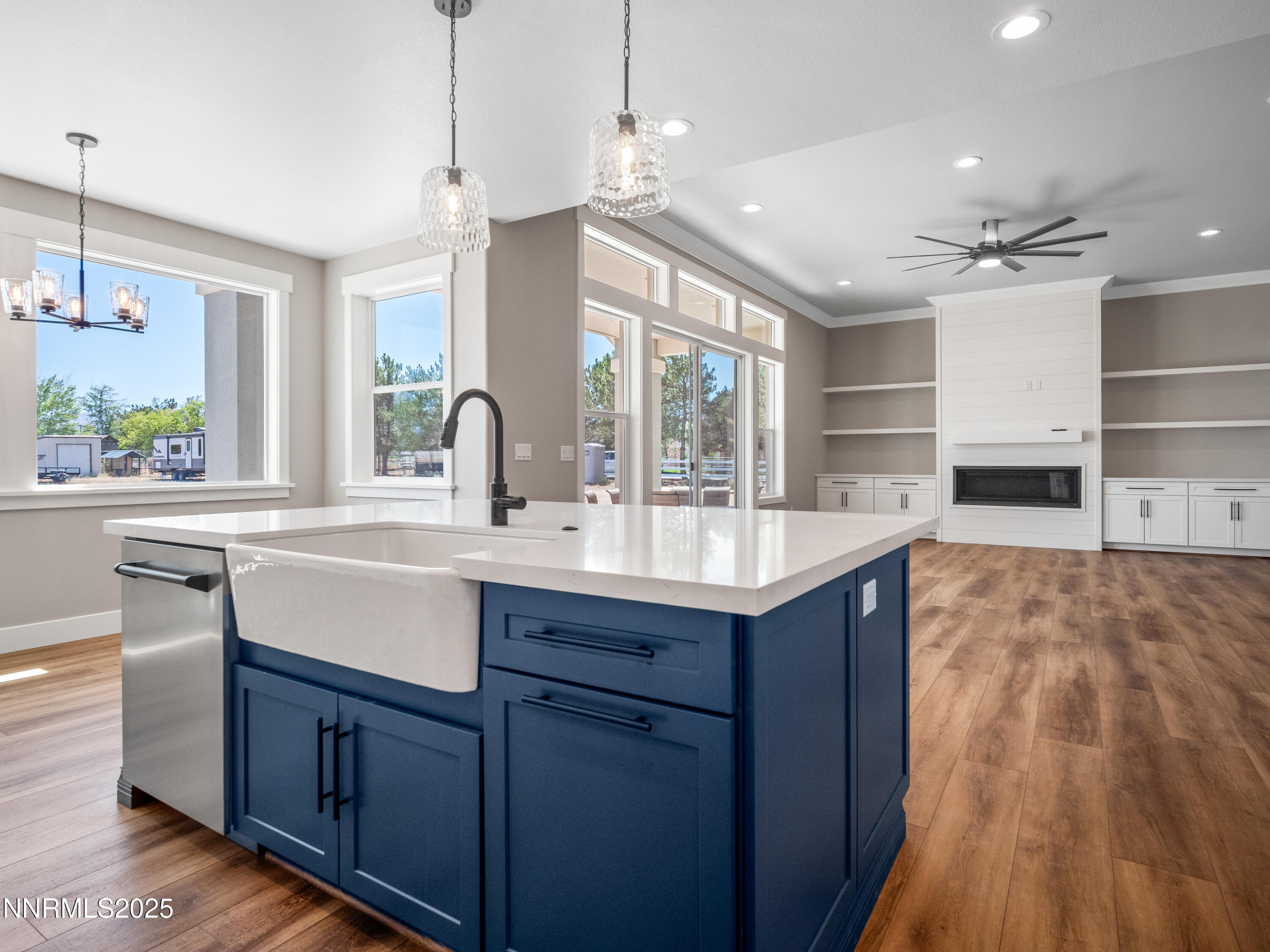 781 Rubio Way Gardnerville, NV 89460 - Photo 12 of 61 a kitchen with kitchen island granite countertop a sink appliances and cabinets