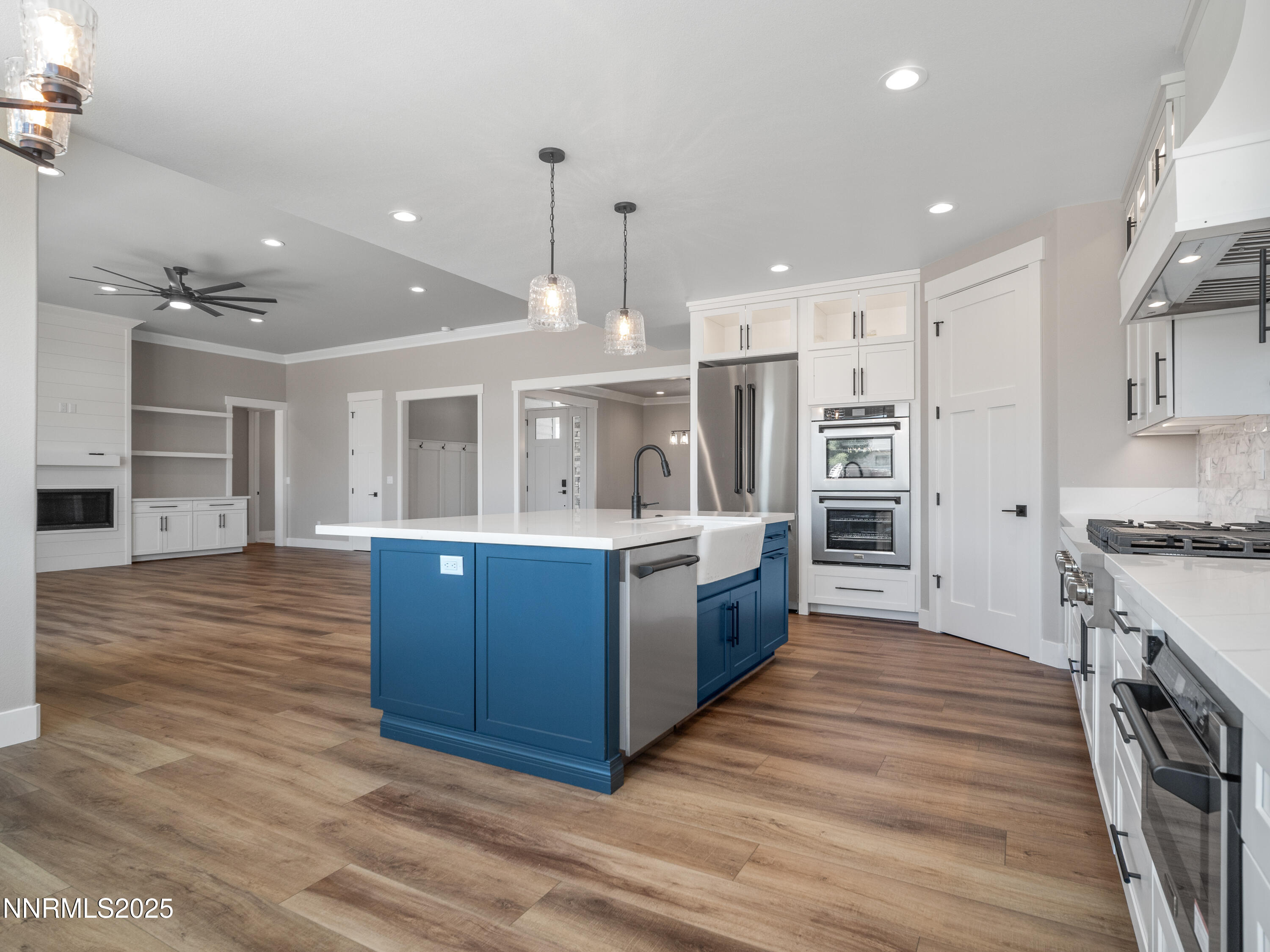 781 Rubio Way Gardnerville, NV 89460 - Photo 16 of 61 a large kitchen with stainless steel appliances granite countertop a large counter top and a stove