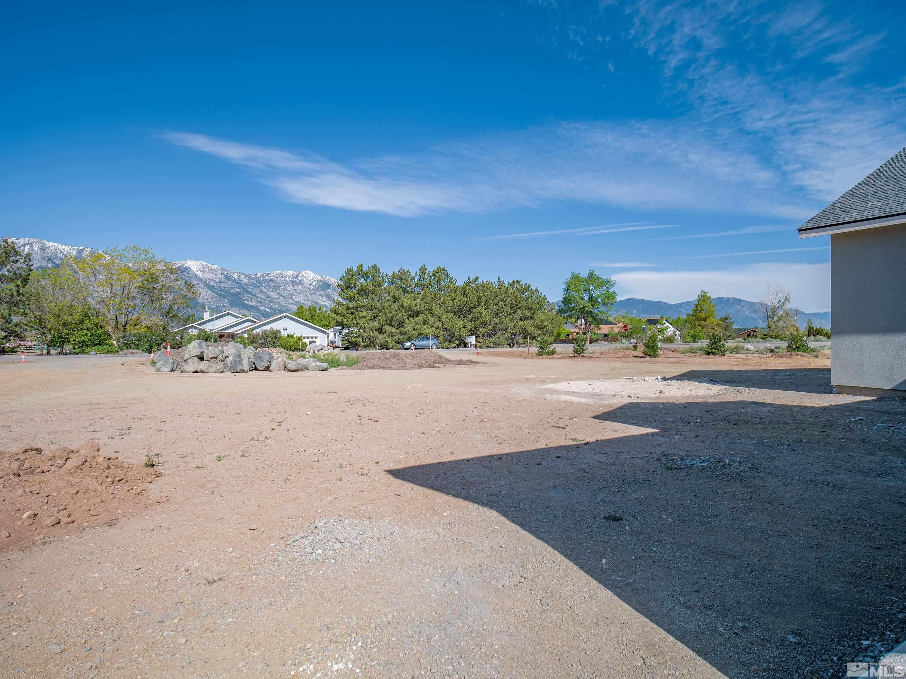 781 Rubio Way Gardnerville, NV 89460 - Photo 27 of 61 a view of a road and a yard