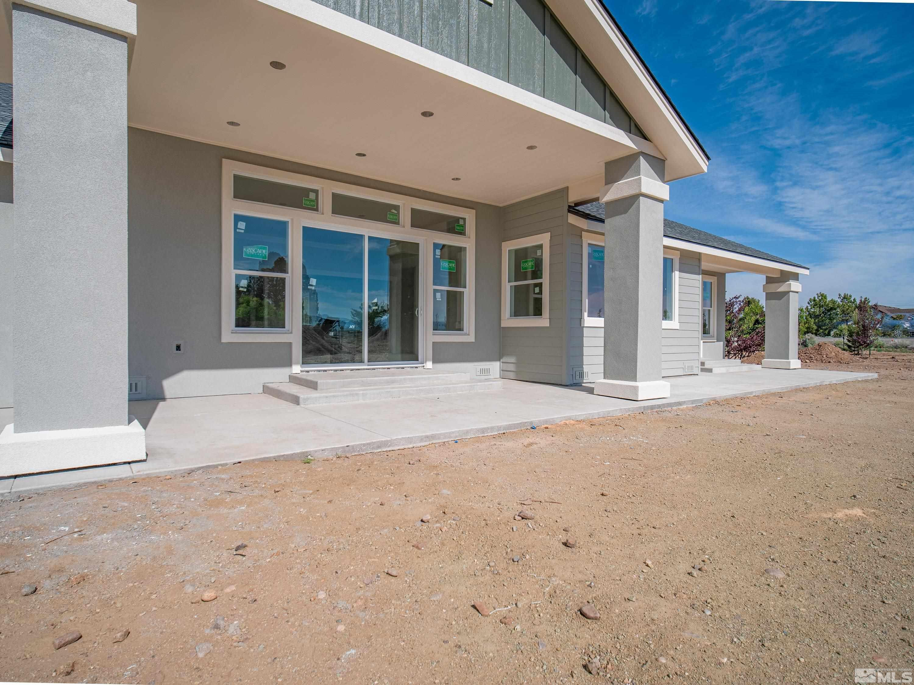 781 Rubio Way Gardnerville, NV 89460 - Photo 31 of 61 a view of a house with backyard and garden