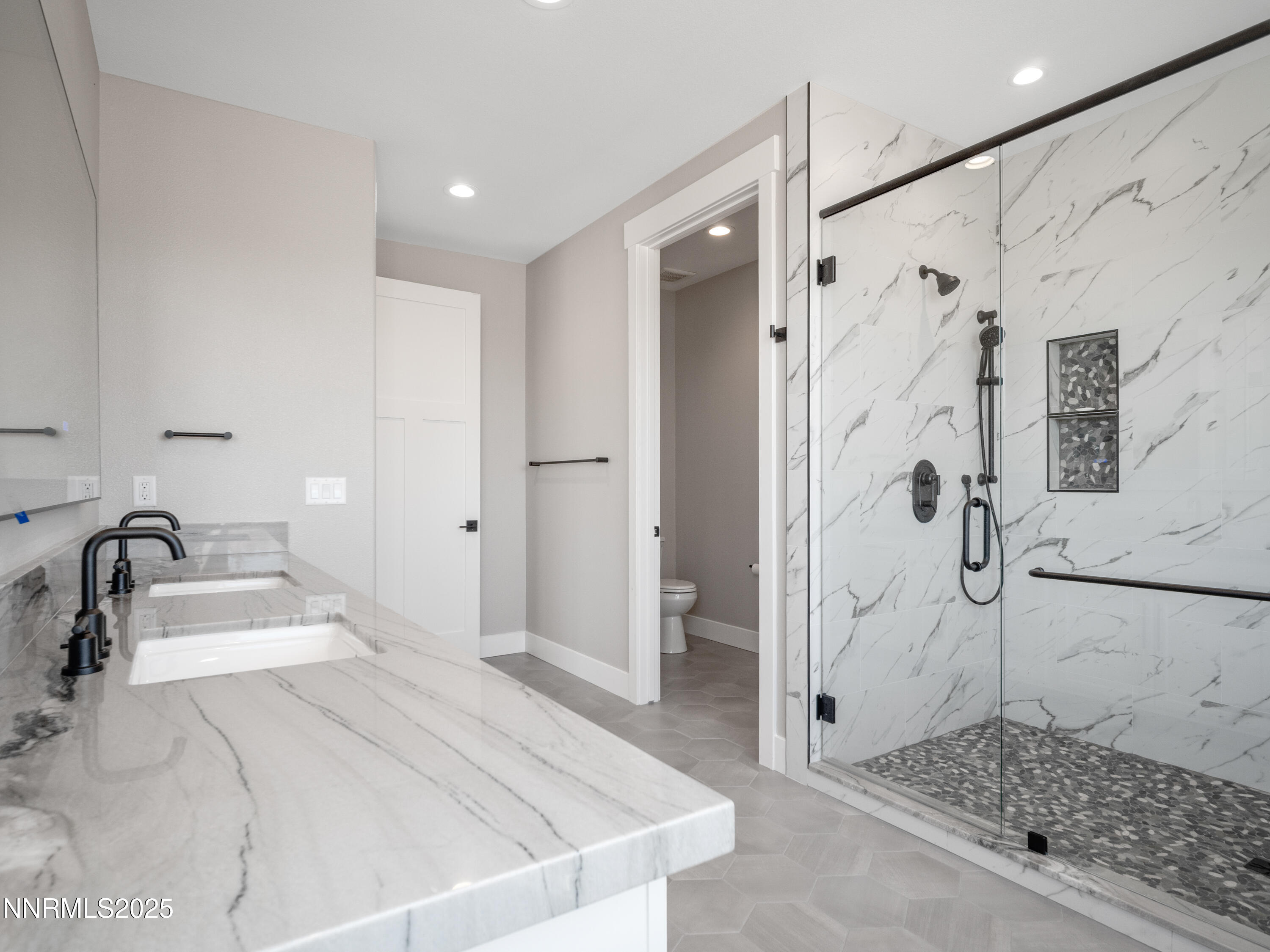 781 Rubio Way Gardnerville, NV 89460 - Photo 50 of 61 a spacious bathroom with a sink and a shower
