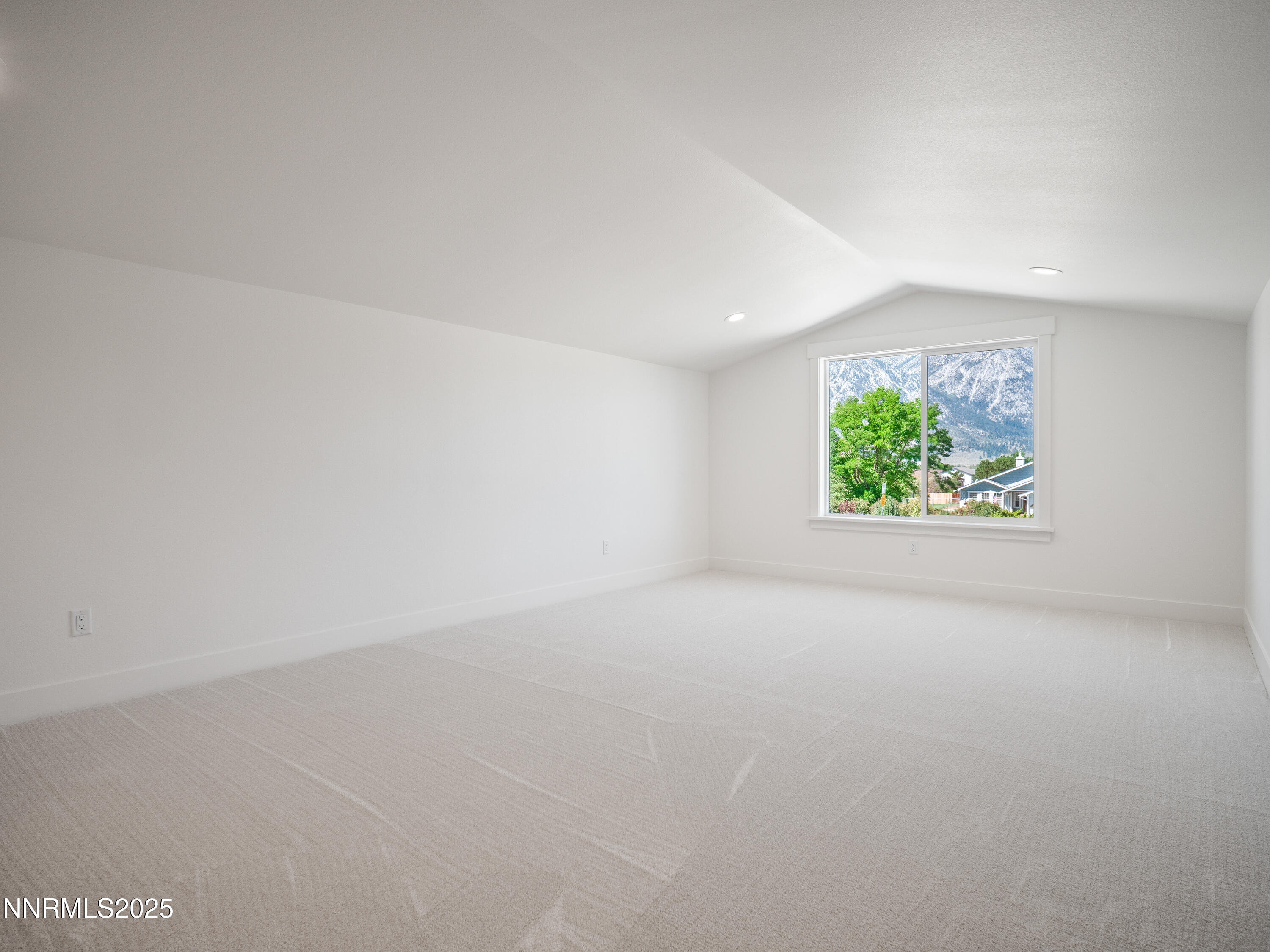 781 Rubio Way Gardnerville, NV 89460 - Photo 54 of 61 an empty room with a window