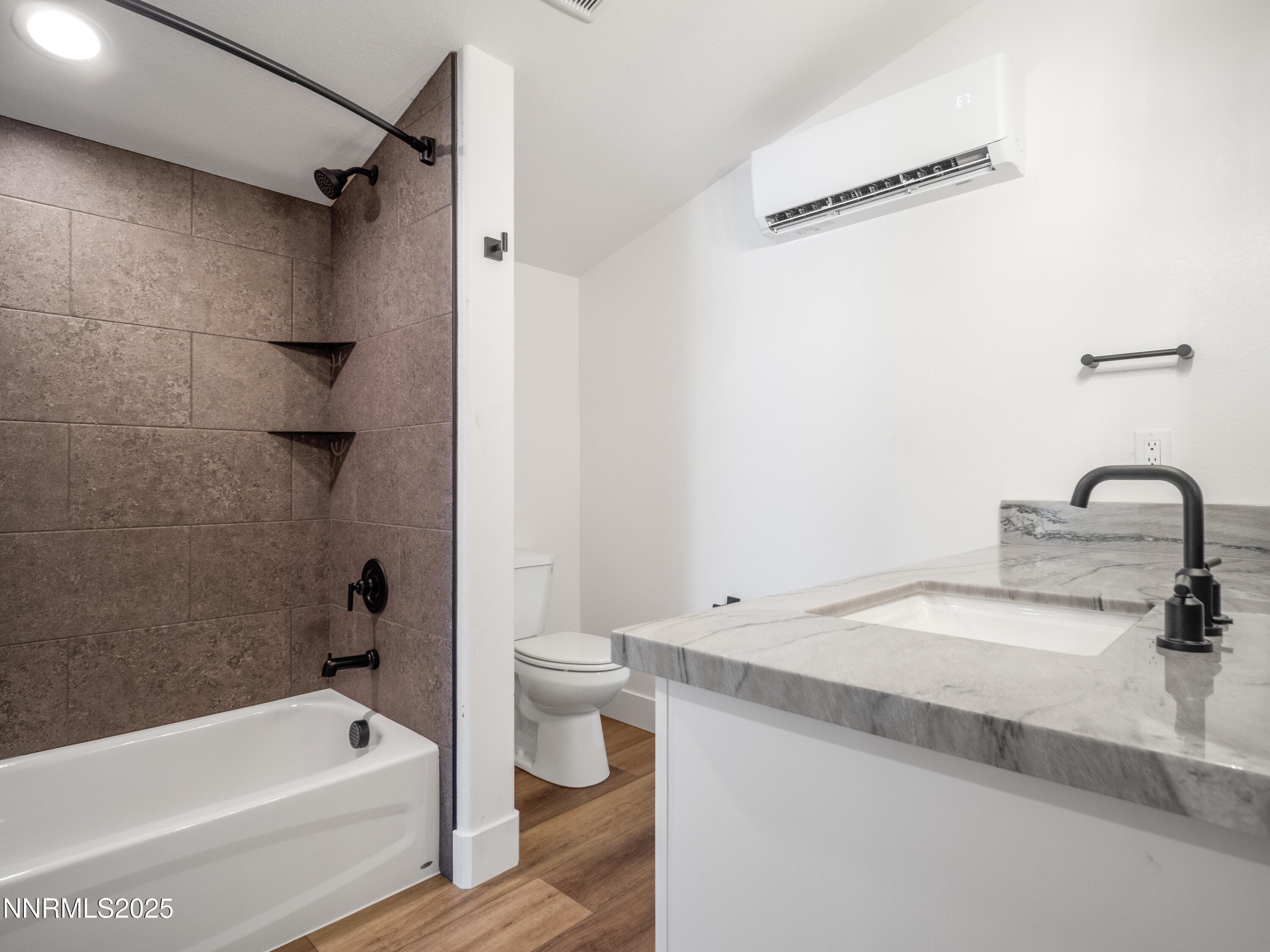 781 Rubio Way Gardnerville, NV 89460 - Photo 60 of 61 a bathroom with a sink a toilet and a bathtub