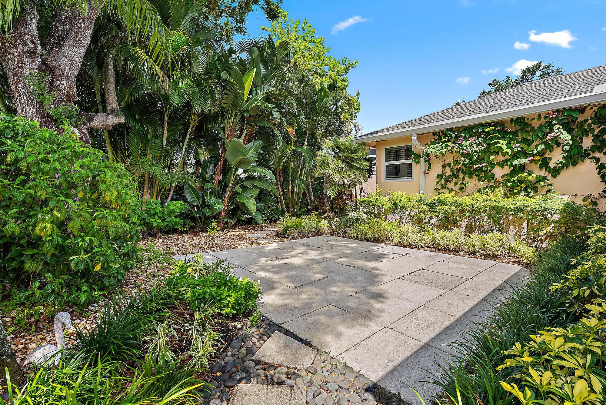 197 Brier Circle Jupiter, FL 33458 - Photo 20 of 33 a view of a backyard with plants